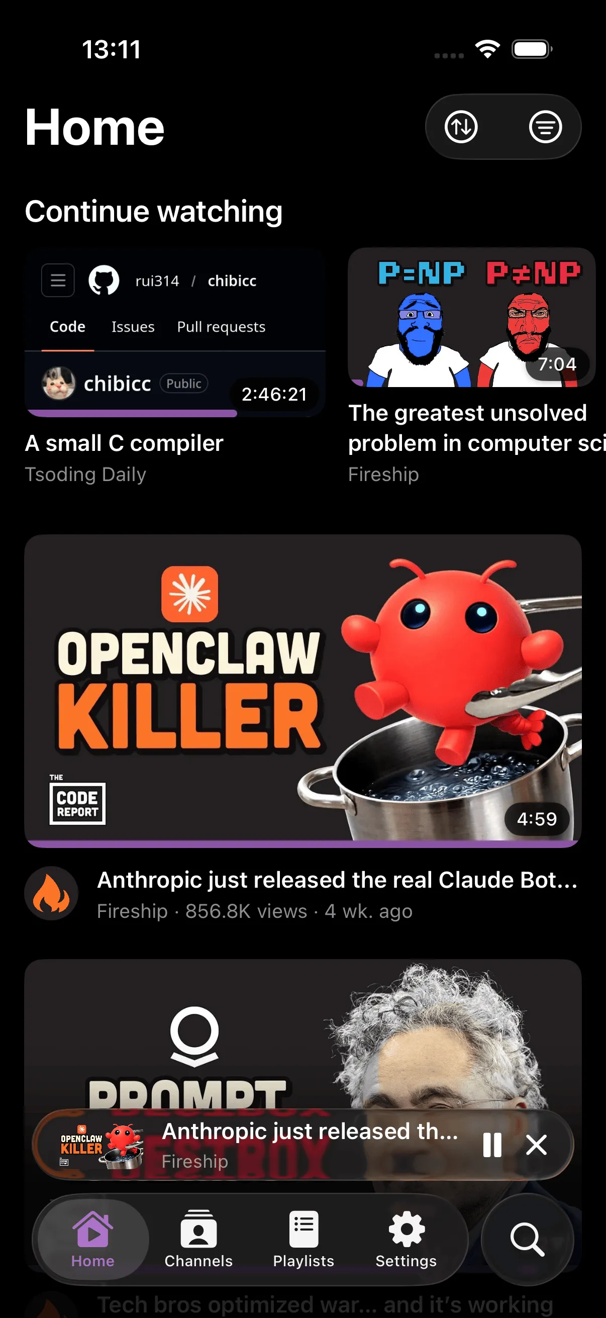 Home feed with persistent mini player at the bottom